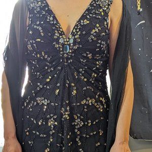 Black dress with green gems